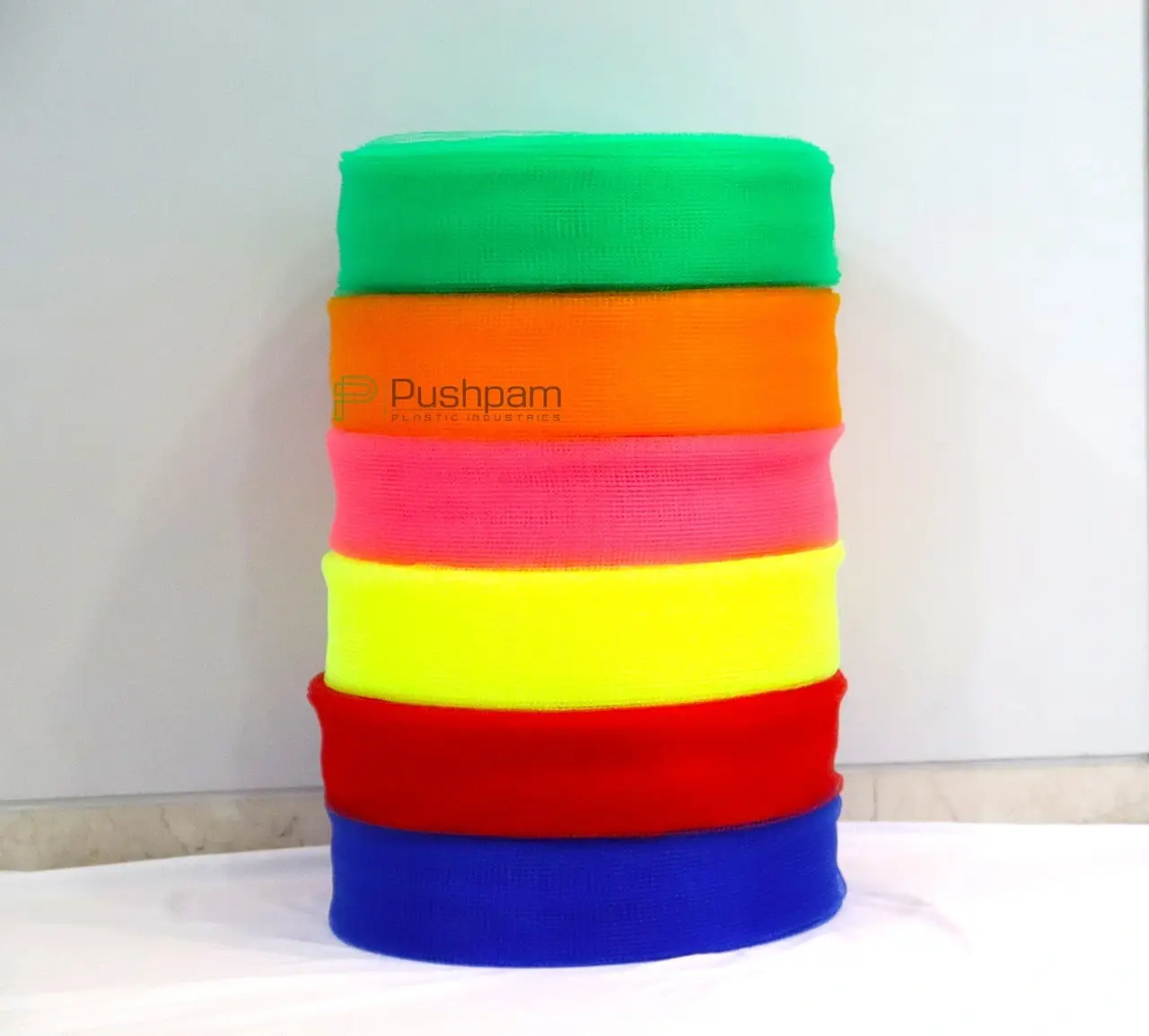 Premium quality nylon scrubber mesh netting in vibrant commercial shade, perfectly roll-pack for smooth operation in automatic cutting and folding machines.