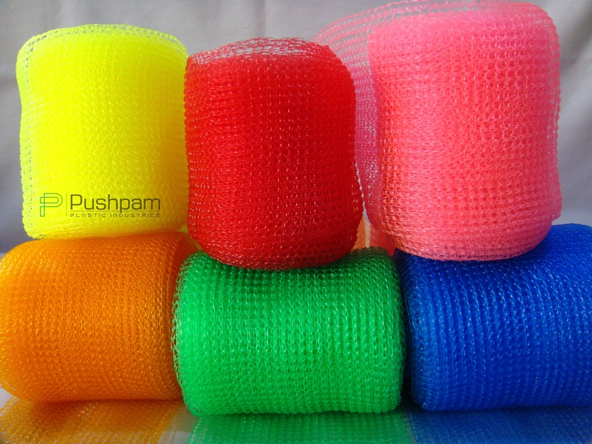 Pushpam Plastic Industries product showcase — Plastic Scrubber Nets, Body Loofah Nets, Packaging Nets, Plastic Niwar, HDPE Ropes, and Monofilament Yarns